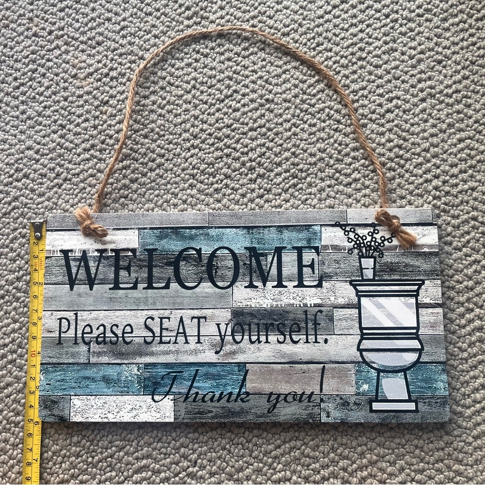 Rustic Welcome Sign with Toilet Graphic